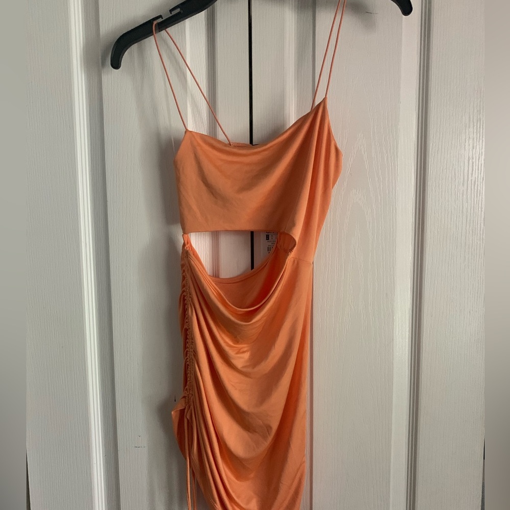 Mini dress, opening stomach, stretchy.